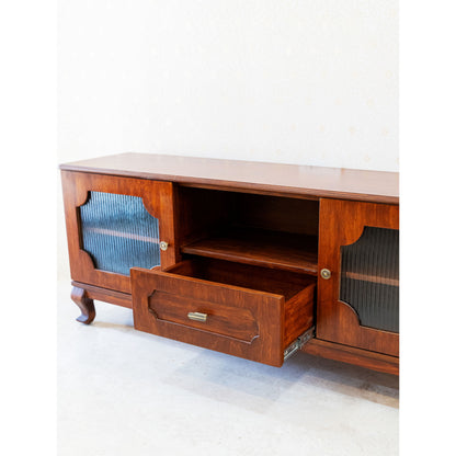 CustHum - Wodden TV cabinet with fluted glass on door panels, showing open middle drawer