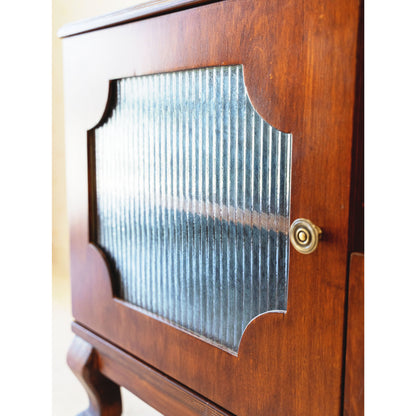 CustHum - Close-up of wooden TV unit, showing handles and craftsmanship on fluted-glass door panels